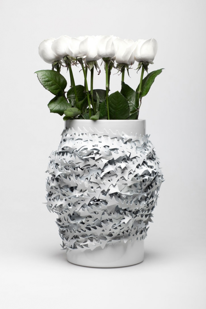 FORBIDDEN VASE // vase covered with strips of leather by Myriam B. Maguire/Fabrica // photo by Gustavo Millon/Fabrica