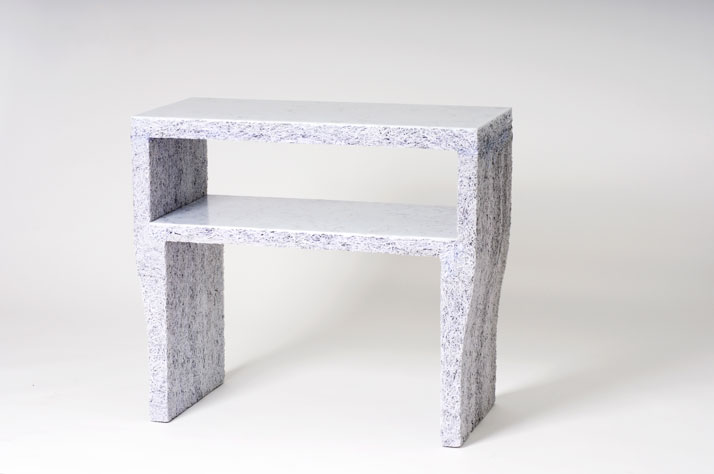 The Shredded Collection Sidetable (White Edition) is made from 6 kg shredded confidential documents and white pigmented resin. The top and inner-shelf