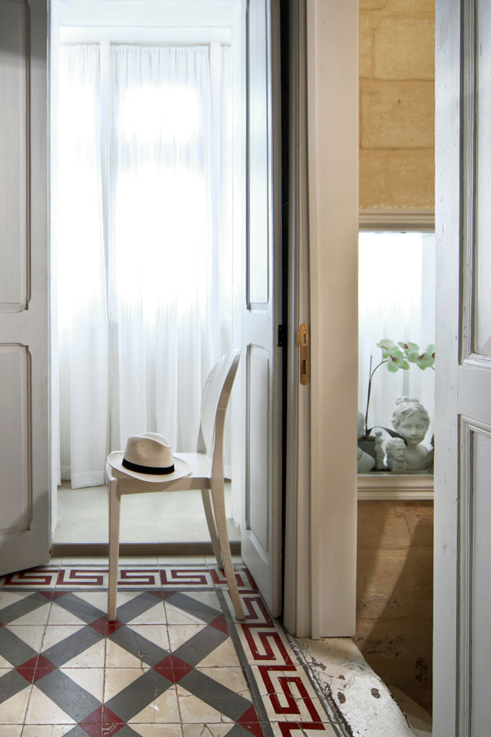 Photo © Brian Grech // Valletta SuitesPhilippe Starck white polycarbonate Victoria chair by Kartell