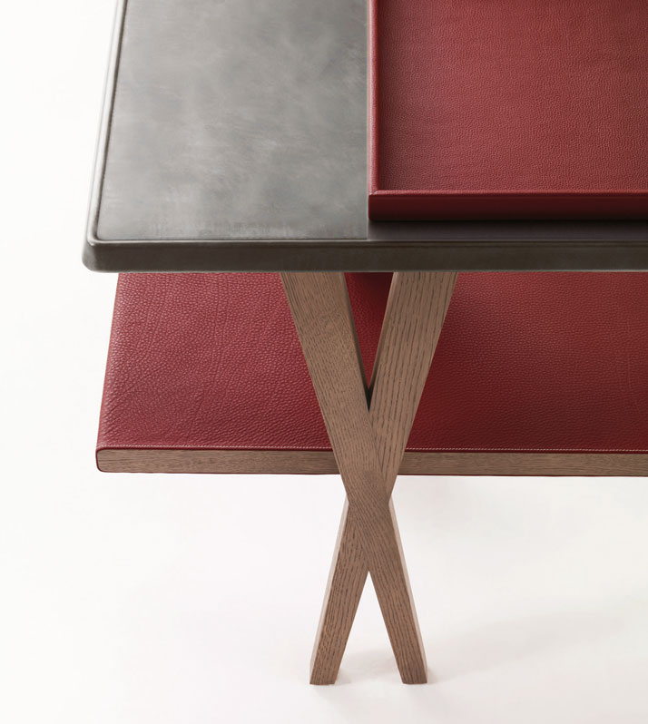 Designer: Antonio CitterioConsole in greyed oak, stainless steel with surface patina and H red Clémence bull calf, Matières collectionImage Courtesy o