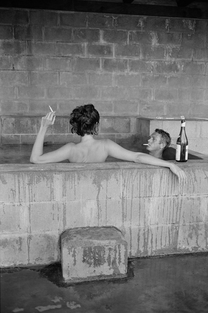 Steve McQueen: KING OF COOLSteve McQueen and his wide, Neile Adams, is sulphur bath, Big Sur, CA, 1963photo © John Dominis / Time Inc. All Rights Rese