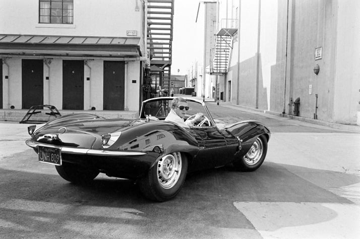 Steve McQueen: KING OF COOLSteve McQueen in black Jaguar at studio, CA, 1963photo © John Dominis / Time Inc. All Rights Reserved.