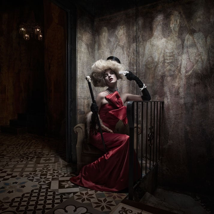 The red madam seated Pearl Necklace: Pericles Kondylatos / Model: Marianna Michailova (VN Models) / Red Dress: Vassilis Emanuel Zoulias couture / Gloves: private collection / Top hat: vintage from private collection / Fox fur: vintage from private collection / Scull head Stick: Pericles Kondylatos stage- wear accessories / Make-up: Christina Ermidis for make-up lab / Wig made by Nicolas Balalios / Photo: Sylwia Makris / Styling: Pericles Kondylatos
