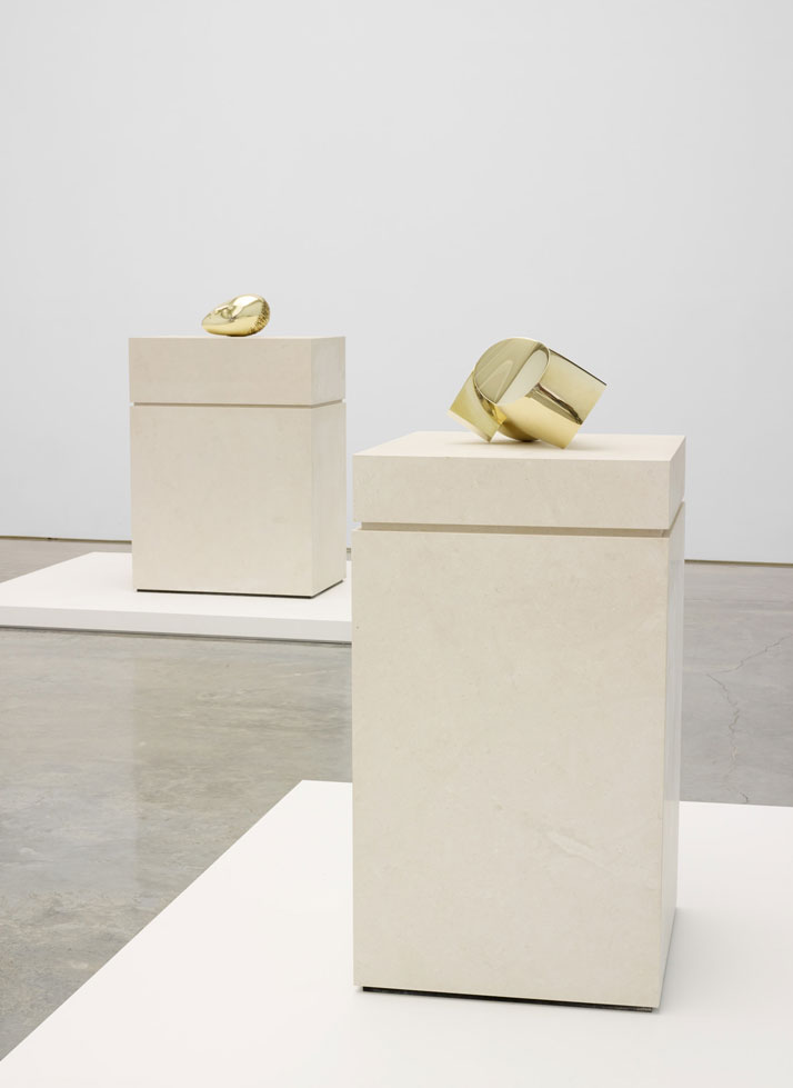 Constantin  Brancusi. From left to right: Sleeping Muse II and Head. Installation  view at Paul Kasmin Gallery during the exhibition ''Brancusi in New York  1913–2013''. Courtesy of the Brancusi Estate and Paul Kasmin Gallery.