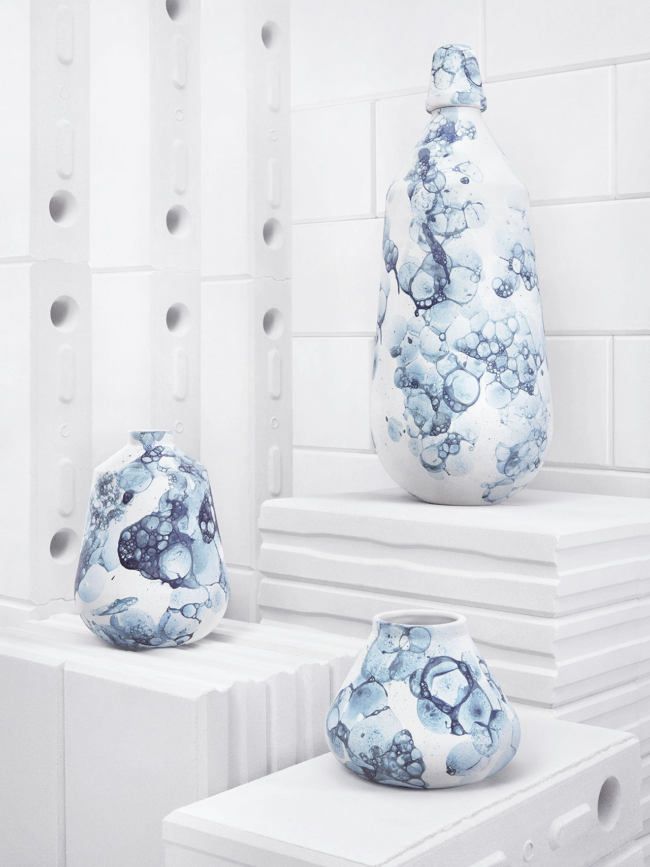 Bubblegraphy series of vases by Adrianus Kundert in collaboration with Thomas van der Sman for Oddness.  The pattern on each vase is created by a special process of blowing air bubbles in the glaze. Photo © Oddness.