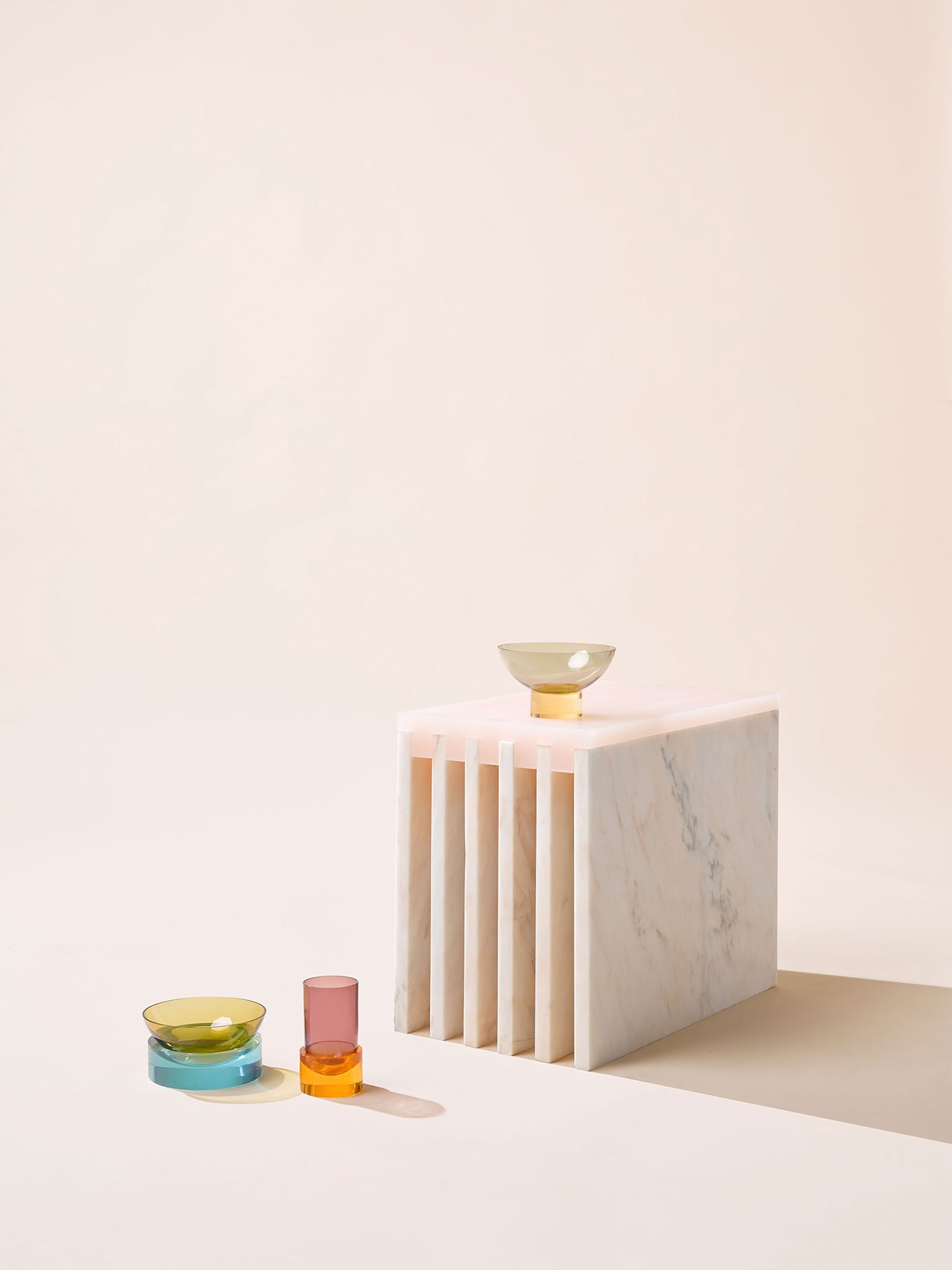 Objects of Common Interest, Side Table, 2016. Marble, Cast Acrylic. Relativity of Color glassware, 2017. Hand-blown Glass, Acrylic. Photo by Brooke Holm.