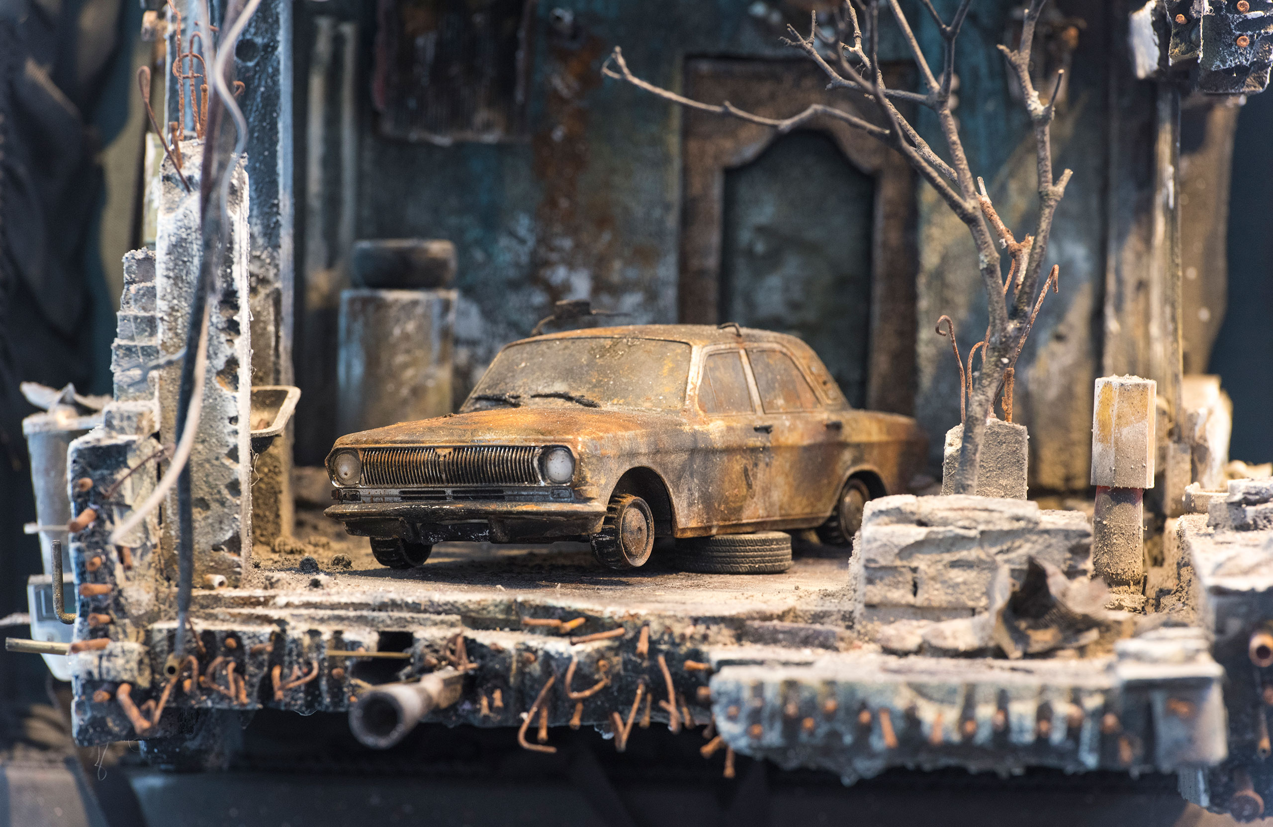 UM SHAHAM: War and a Burnt Car. Photo by Rodney Nelson.