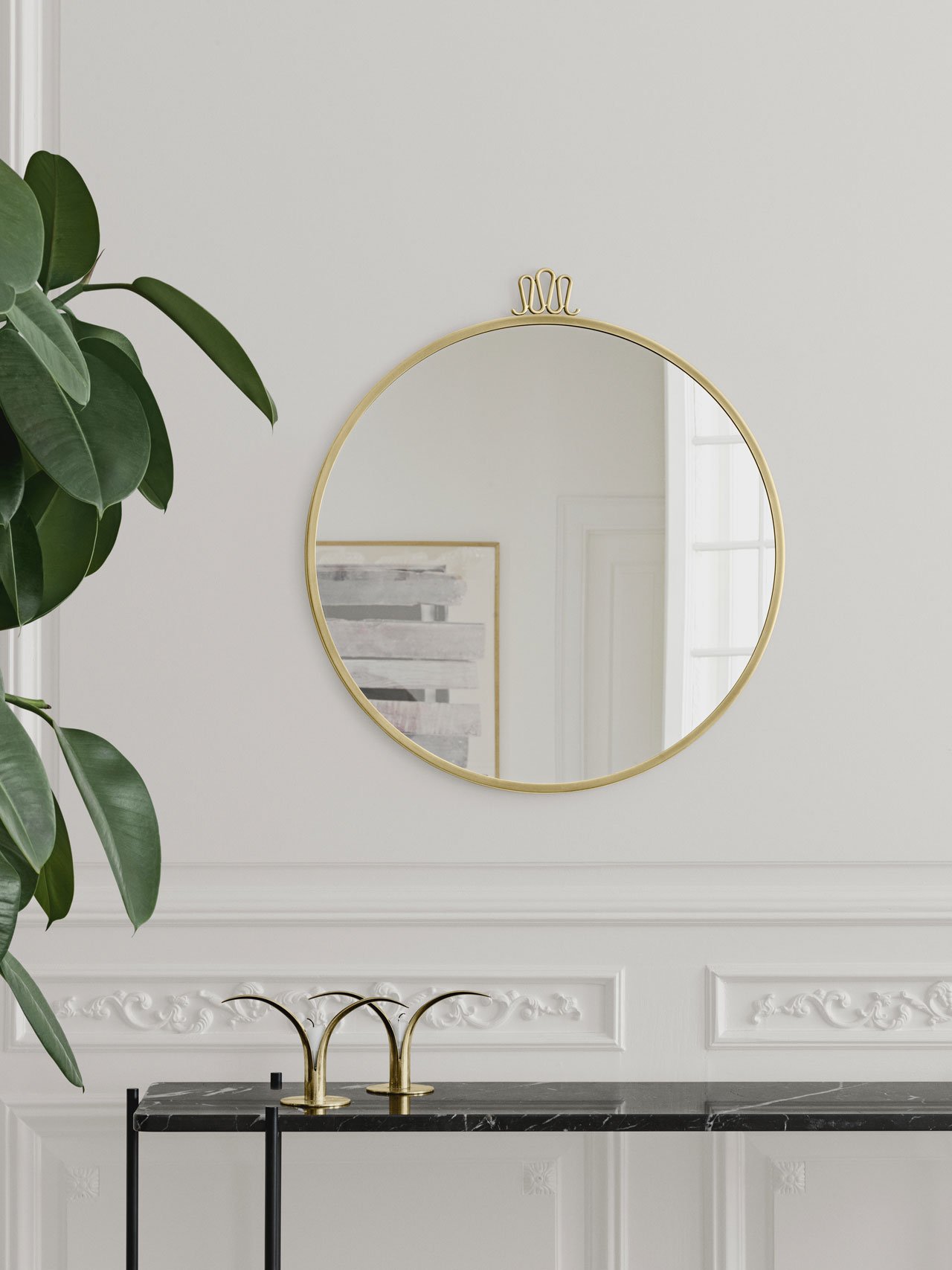 One of Gio Ponti's signature designs is the Randaccio mirror from 1925. ''Designed for his own home on Via Randaccio in Milano, his very first architectural project, the Randaccio mirror decorated the walls in his bedroom on the 3rd floor together with other furniture designed especially for the apartment.'' Since 2015 the mirror is reproduced by Gubi.