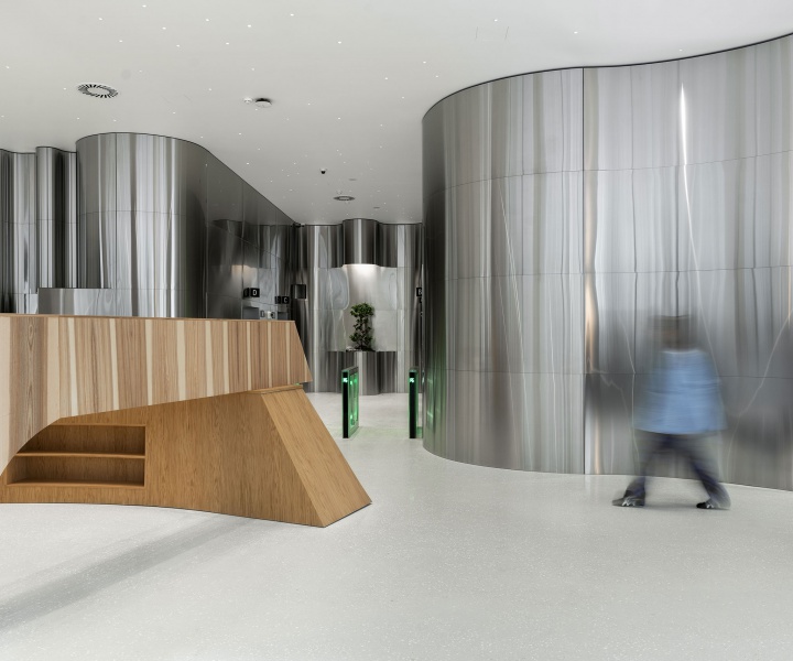 A Futuristic Corporate Lobby Blends Nature-Inspired Elements with Industrial Touches