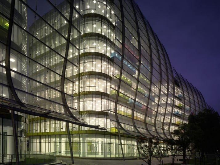 Night view, wave facades, lighting exposes hidden layers photo © Christian Richters, 2009