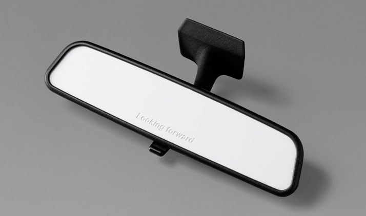 Stefan  Diez’s (Germany) “Looking Forward”, a rearview mirror with text that  reads “Looking Forward” –a fitting piece for a 25th anniversary  celebra