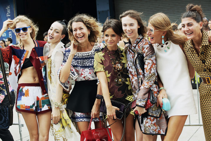 from left to right: Elena Perminova, Michelle Harper, Natalie Joos, Miroslava Duma, Anya Ziourova, Anna Dello Russo, Giovanna Battaglia  photo © Streetfsn by Nam.