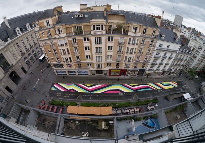 Lang-Baumann, Street Painting #7, 2013, 59 x 3,8 m, road marking paint. Rennes (France). Produced by 40mcube and PHAKT, in partnership with Signature and Identic, and with the support of the City of Rennes and the Swiss Art Concil Pro Hevetia. Courtesy Loevenbruck gallery and Urs Meile gallery. Photo : Lang-Baumann.