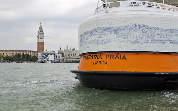 Joana Vasconcelos, Trafaria Praia, 2013.Trafaria Praia is Vasconcelos's proposal for the Participation of Portugal at the 55th International Art Exhibition - la Biennale di Venezia. 1960 motor-driven steel passenger ferry.3010 x 750 x 1430 cm Great Panorama of Lisbon (21st Century), 2013.Viúva Lamego hand-painted, tin-glazed ceramic tiles on a sandwich-structured composite panel.220 x 6000 cmValkyrie Azulejo, 2013 Handmade woollen crochet, fabrics, ornaments, polyester, LEDs and electric system.Dimensions variable.Courtesy of the artist and the Transtejo - Transportes Tejo, S.A., Lisbonphoto © Joana Vasconcelos.