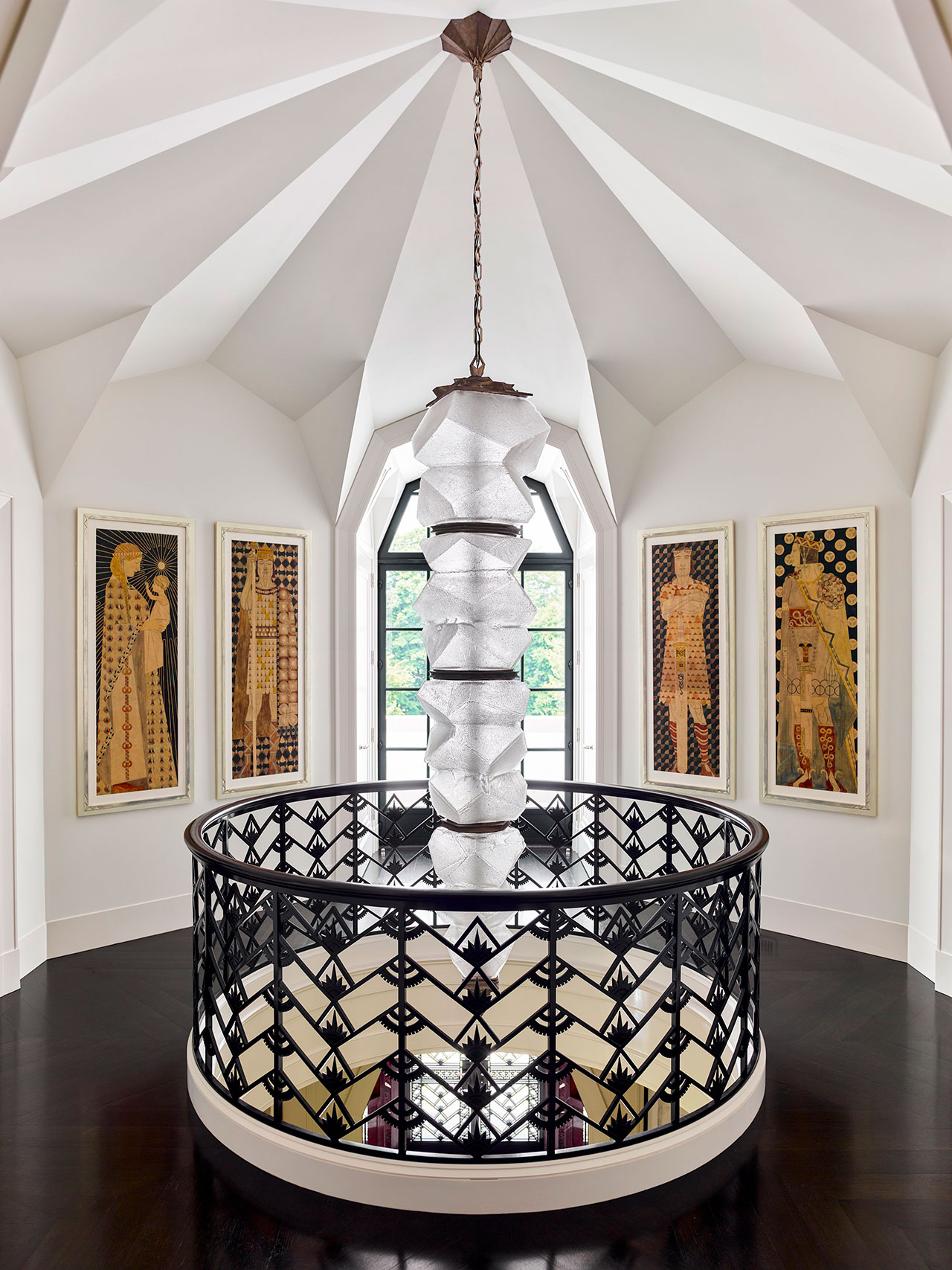 Tribune: A jagged hand-blown cut-glass and cast-bronze light fixture by Thaddeus Wolfe (2015) descends from the faceted planes of the vaulted ceiling. Hung on the angled walls are Josef Engelhart’s pencil-and-watercolor sketches for his Merlinsage frieze (1904).
Photography by Eric Piasecki.
