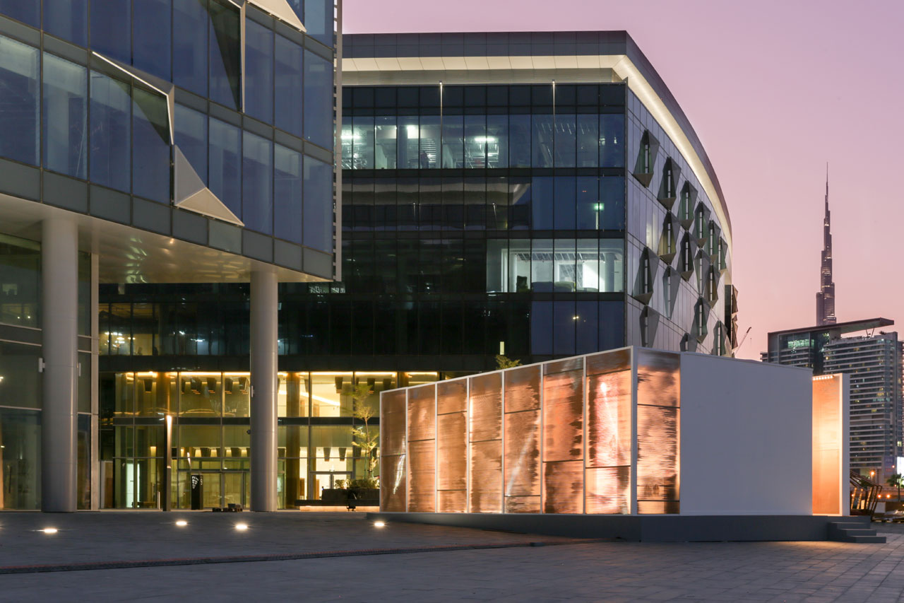 The extterior of the six pavilions built to celebrate and showcase the work of local designers, studios and curators from six different countries in the MENASA region integrated into the walkways of d3 designed by Dubai-based LOCI architects. Photo © DXBDW.