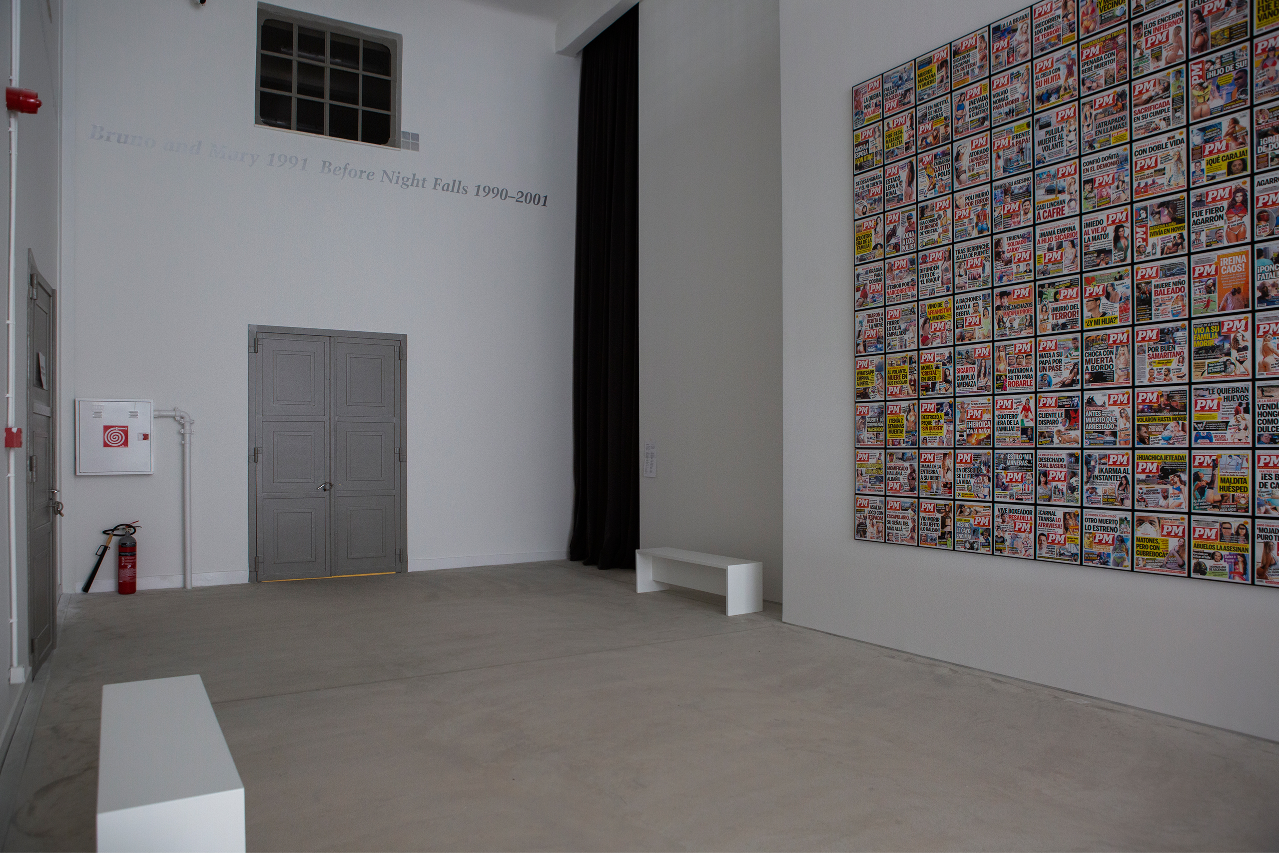 Installation View Portals, Hellenic Parliament + NEON at the former Public Tobacco Factory, Photography © Natalia Tsoukala. Courtesy NEON
Featured (from left):
Felix Gonzalez-Torres, "Untitled", 1989. Paint on wall Dimensions vary with installation. The Art Institute of Chicago: bequest of Carolyn Spiegel; Watson F. Blair Prize, Muriel Kallis Newman, Sara Szold and Modern and Contemporary Discretionary funds; Samuel and Sarah Deson and Oscar L. Gerber Memorial endowments; and The San Francisco Museum of Modern Art, Accessions Committee Fund Purchase: gift of Jean and James E. Douglas Jr., Carla Emil and Rich Silverstein, Collectors Forum, Doris and Don Fisher, Niko and Steve Mayer, Elaine McKeon, and Danielle and Brooks Walker, Jr.
Teresa Margolles, PM 2020, 2021. 314 print reproductions on photographic paper of covers of the evening newspaper PM from Ciudad Juárez, Mexico, published in 2020. 31 × 27.5 × 2 cm each (framed). Edition 1 of 3 +1 AP + 1 EC. Courtesy of the artist and James Cohan, New York Commissioned by NEON.