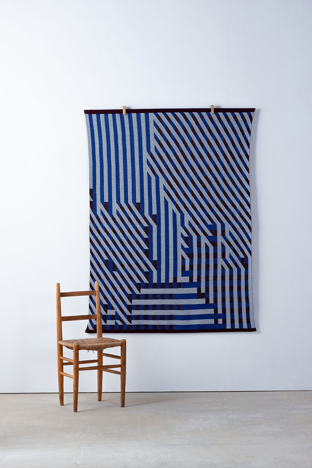 Erwan Bouroullec, RKWH 02 (Risk Knit Large - Navy, burgundy, beige), 2022.
Wool. 155× 130cm
From the Risk Knit series by Erwan Bouroullec.  Courtesy of Ronan &amp; Erwan Bouroullec studio.