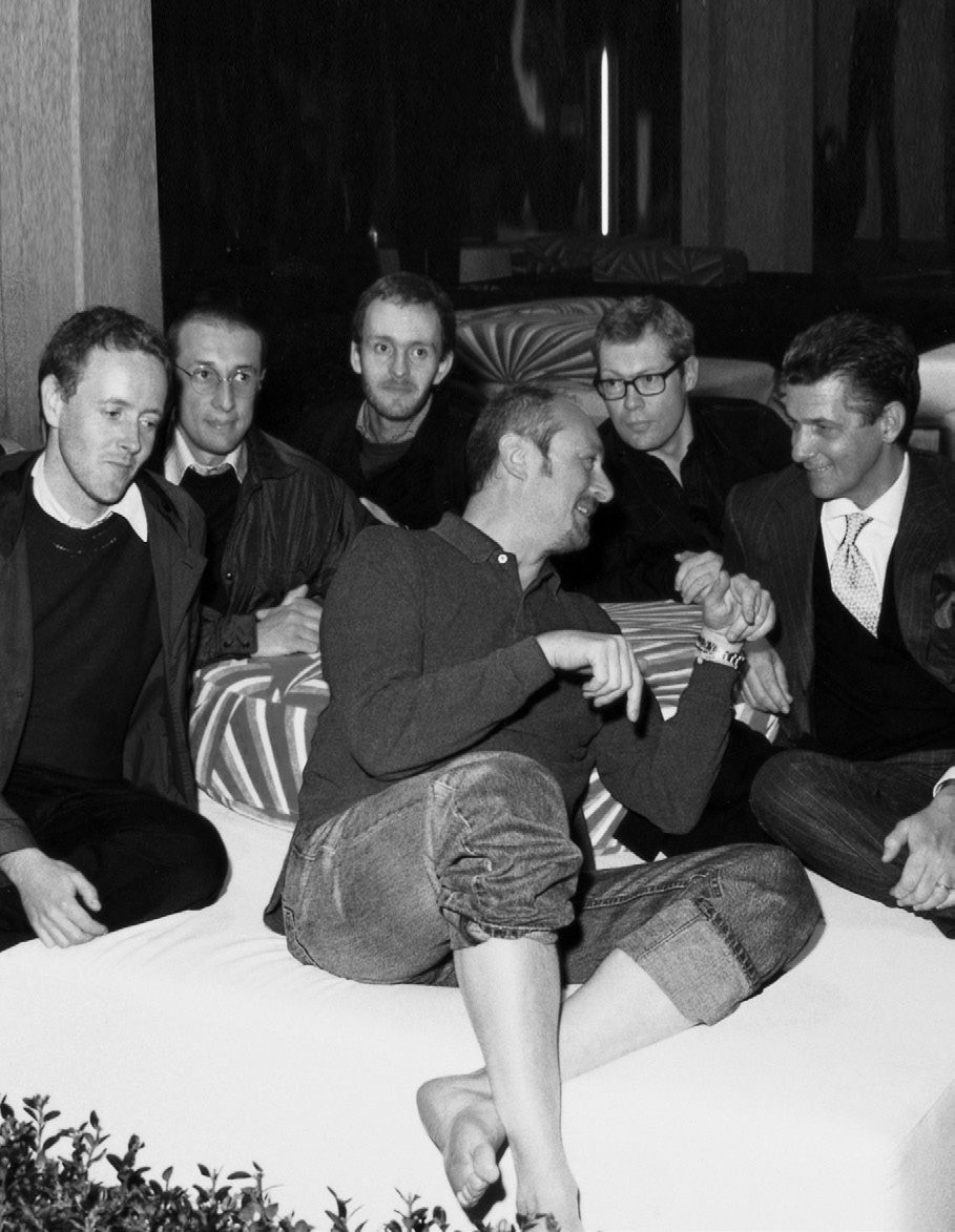 Giulio Cappellini with a few of his chosen designers, including, clockwise from left, Ronan Bouroullec, Carlo Colombo, Erwan Bouroullec, Jasper Morrison and Piero Lissoni. 2003.