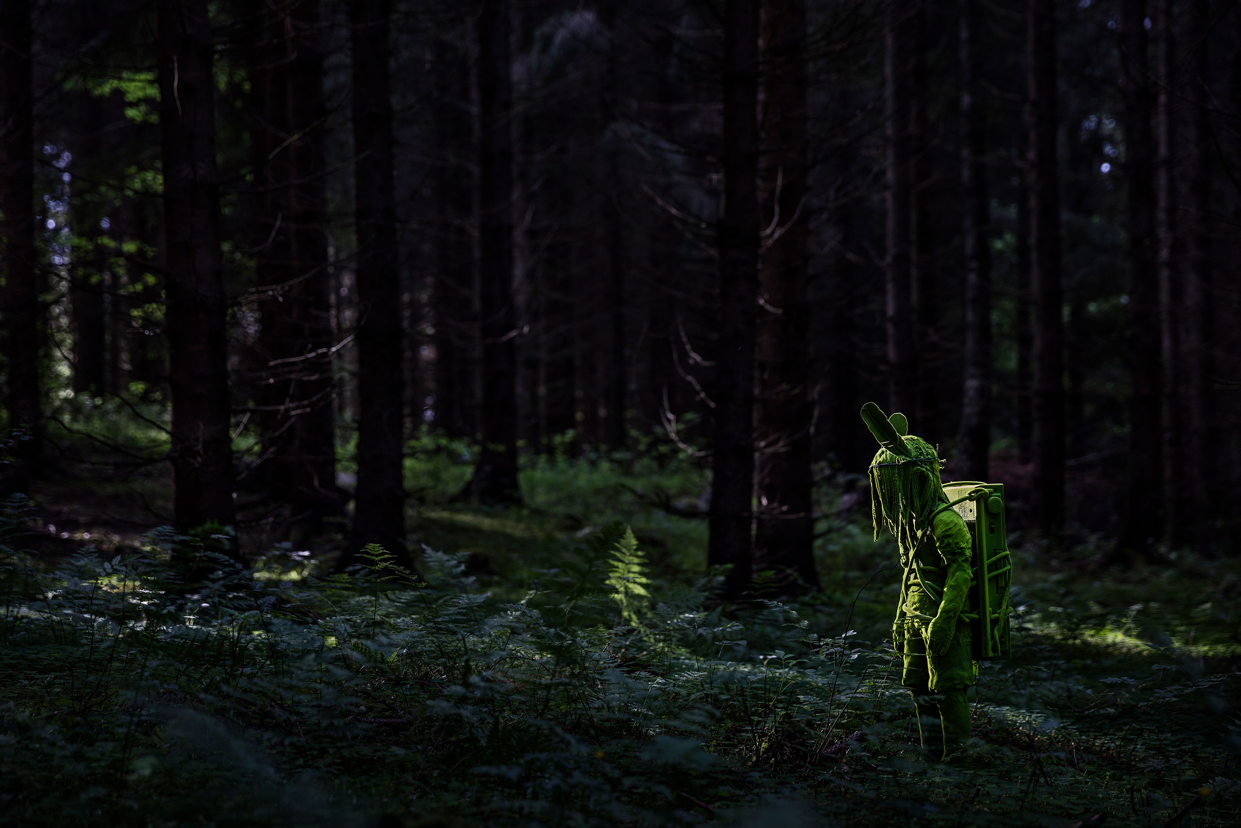 One of Kim Simonsson’s Moss Children photographed out in the landscape of the Finnish Countryside. Photography by Jefunne Gimpel, courtesy of the artist.