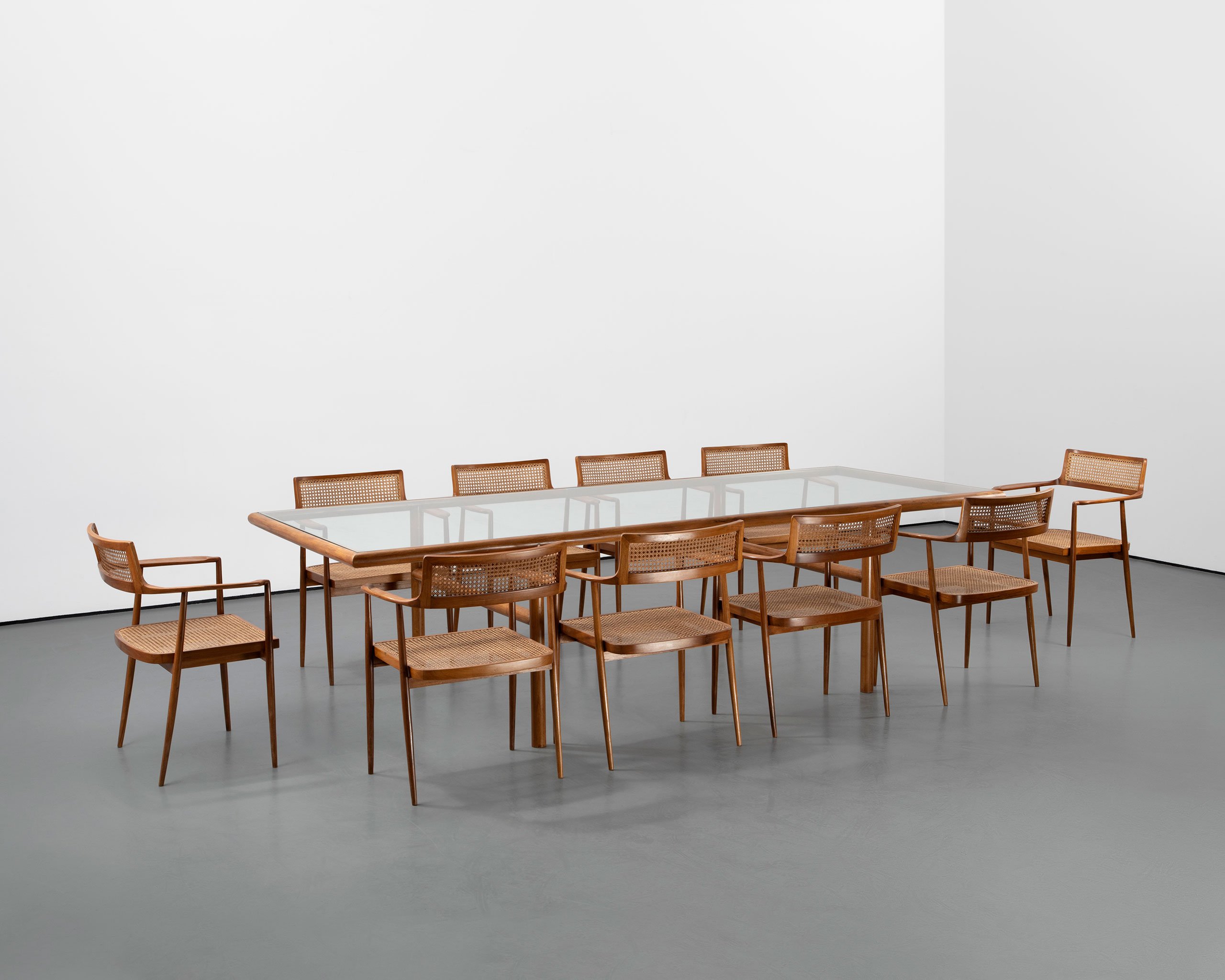 Dining table and chairs by Joaquim Tenreiro. Photography © Carpenters Workshop Gallery.