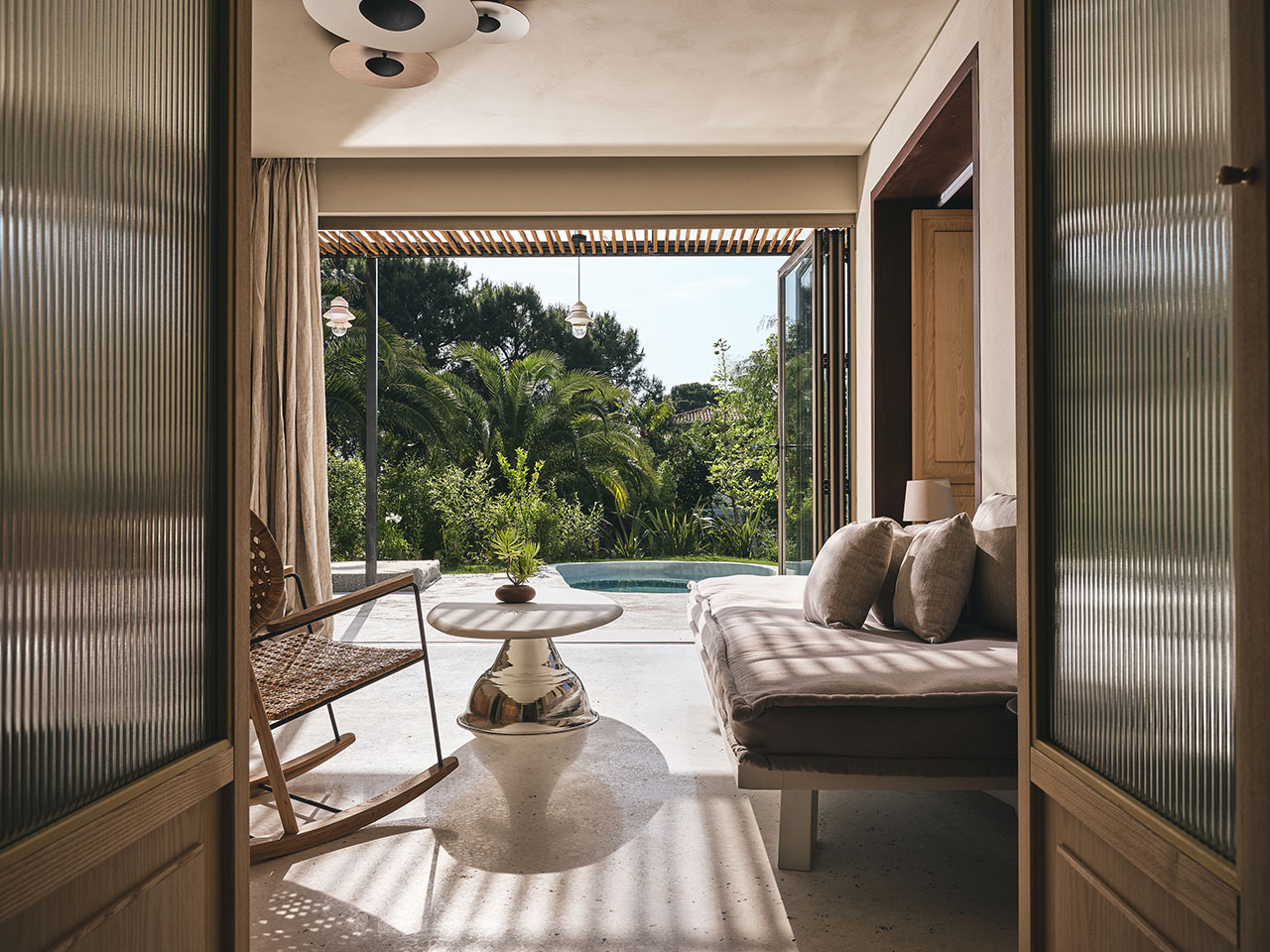 Minimalist suite with private pool overlooking the resort’s lush gardens. © Ekies All Senses Resort |  Vourvourou, Halkidiki, Greece.