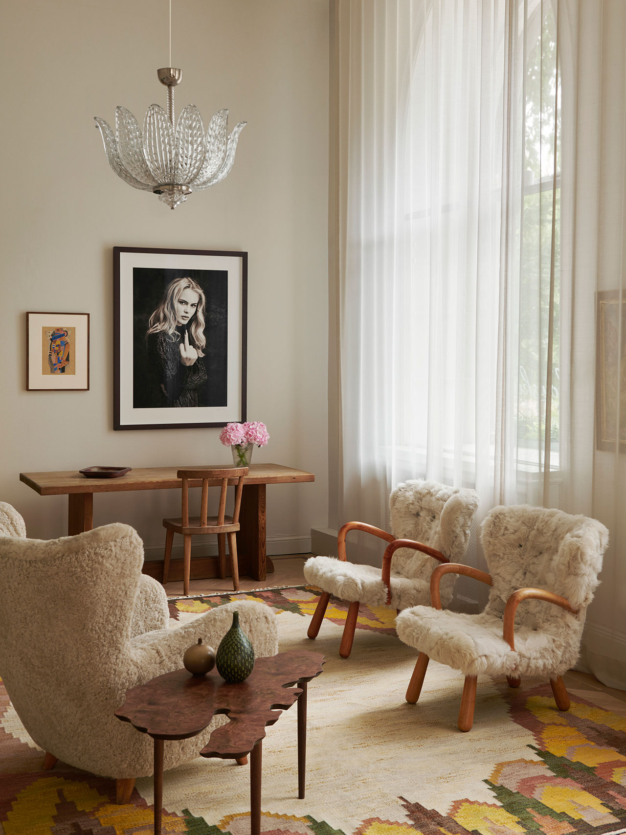 'Made in Sweden' exhibition by Bukowskis.
Featured: Easy chair by Olle Sjögren (left); Side table by Michael Anastassiades for Svenskt Tenn; 'Åke' easy chairs by IKEA (left); Pine furniture by Axel Einar Hjorth (in the back); Pendant light Fritz Kurz; Carpet by Judith Johansson; Art by Gösta Adrian-Nilsson and Albert Wiking.
Photography courtesy of Bukowskis.