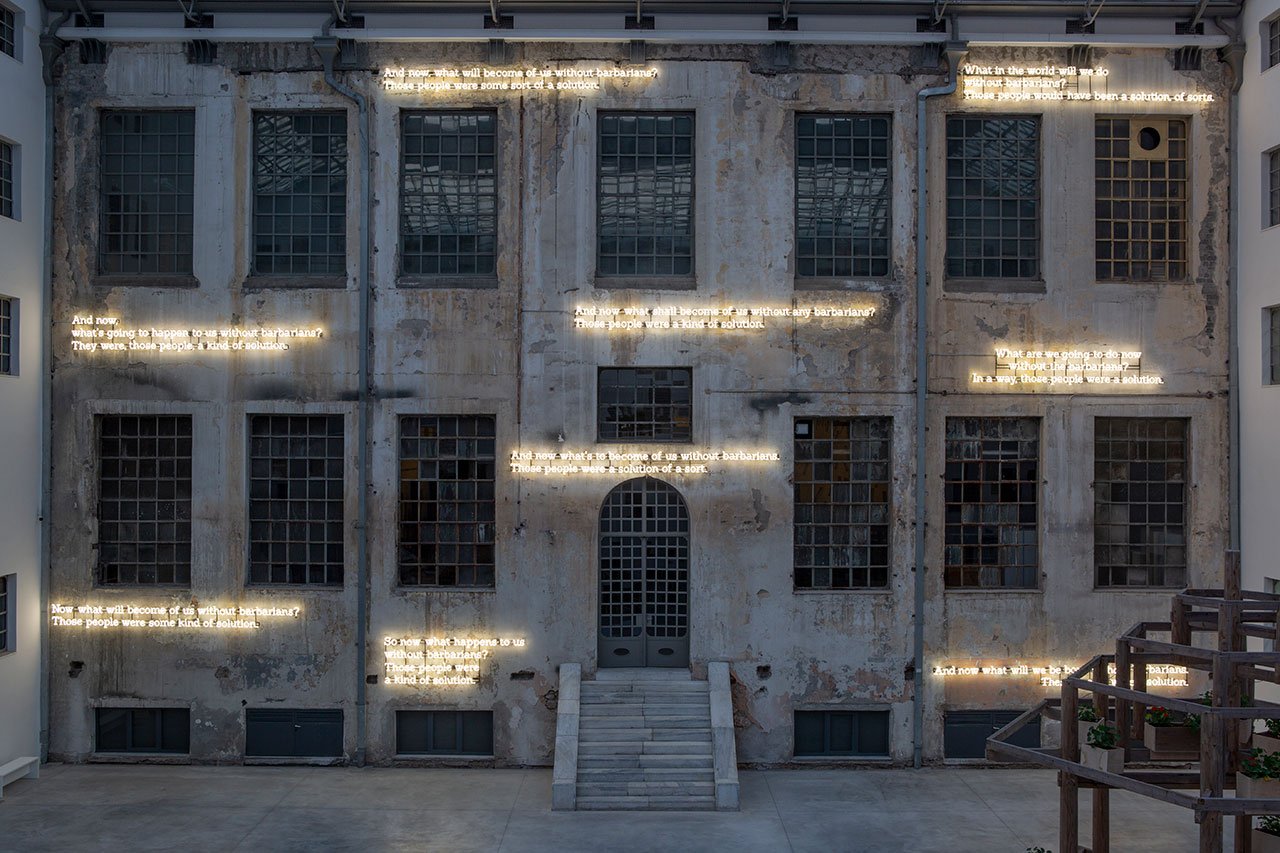 Installation View Portals, Hellenic Parliament + NEON at the former Public Tobacco Factory, Photography © Natalia Tsoukala. Courtesy NEON
Featured:
Glenn Ligon, Waiting for the Barbarians (detail), 2021. Neon. Dimensions variable. Courtesy the artist and Thomas Dane Gallery Commissioned by NEON.