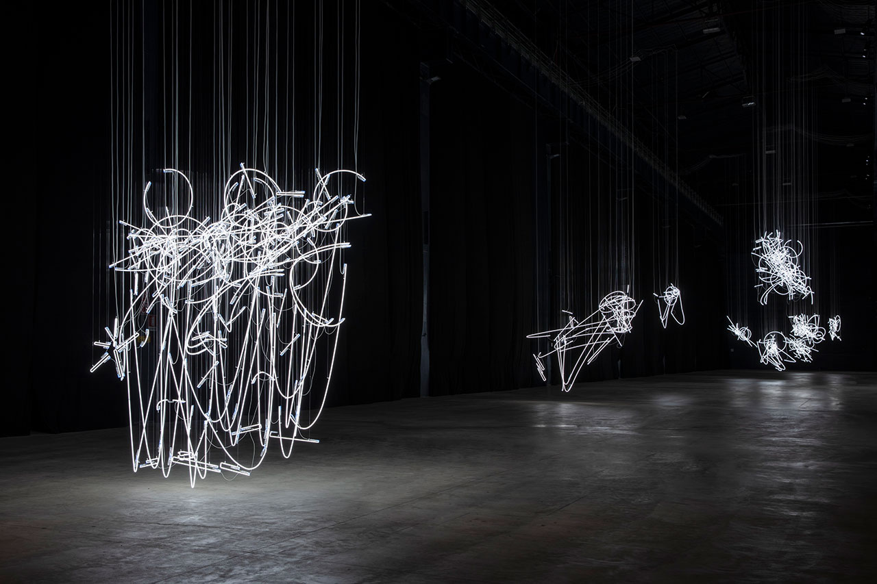 Cerith Wyn Evans, Neon Forms (After Noh), 2015-2019. Installation view at Pirelli HangarBicocca, Milan, 2019. Courtesy of the artist; White Cube; Marian Goodman Gallery, New York, Paris and London, and Pirelli HangarBicocca. Photo: Agostino Osio.