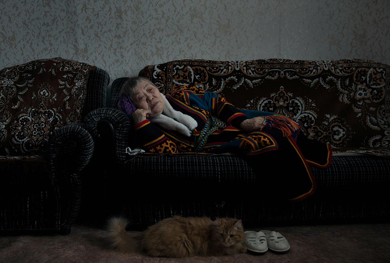 Zinaida Evay (Born.1946) and her cat Persik (“peach” in Russian). Yar-Sale, Yamalo-Nenets Autonomous Okrug, Russia.Zinaida was married for many years, and she shared with me that she had a beautiful and loving bond with her husband, right to his last day. Now, after he passed away, she is living in their small apartment alone, with almost no one to come and visit. 
Photo © Oded Wagenstein.