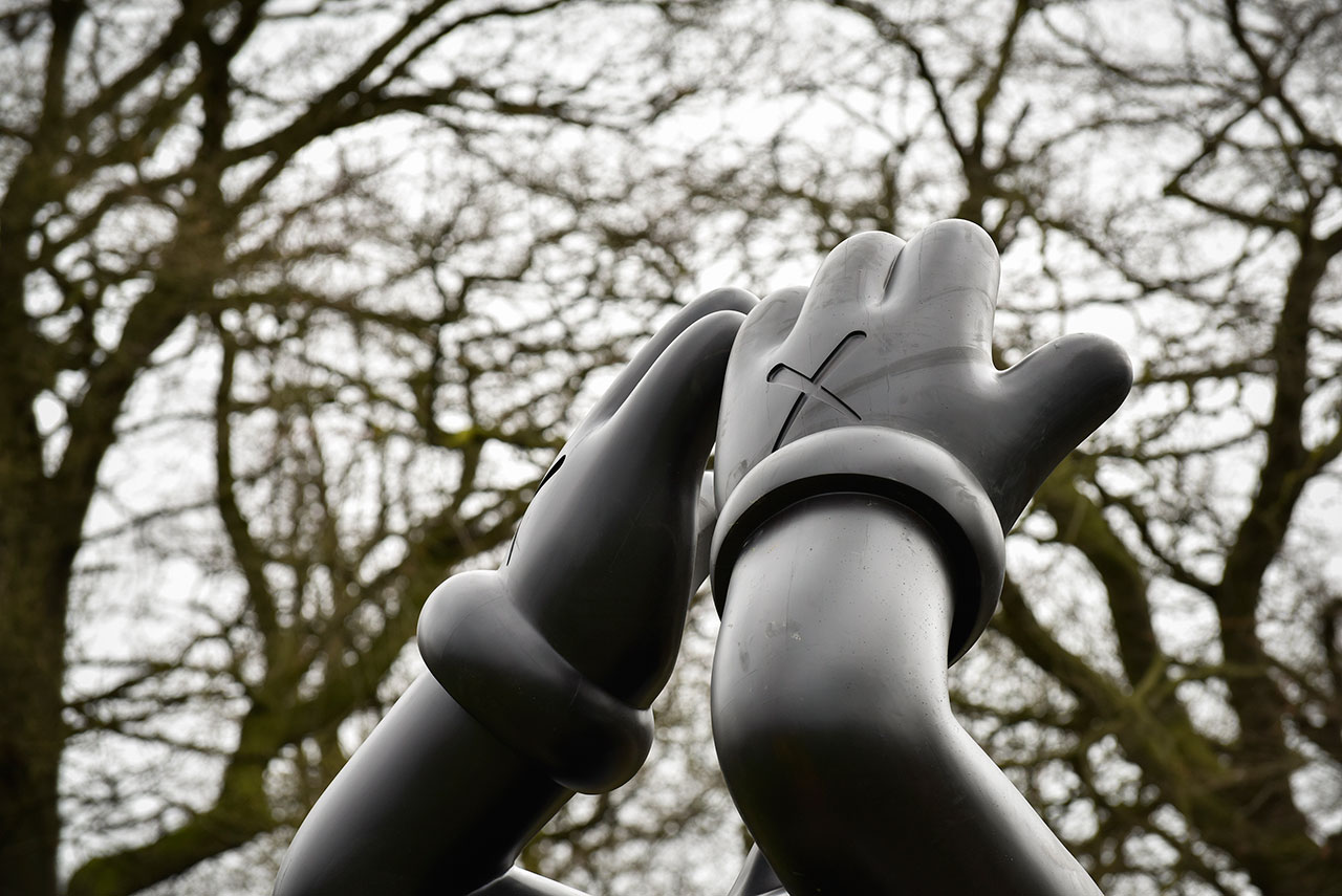 Installation of KAWS sculpture at Yorkshire Sculpture Park, 2016. Courtesy the artist and YSP. Photo © Jonty Wilde.