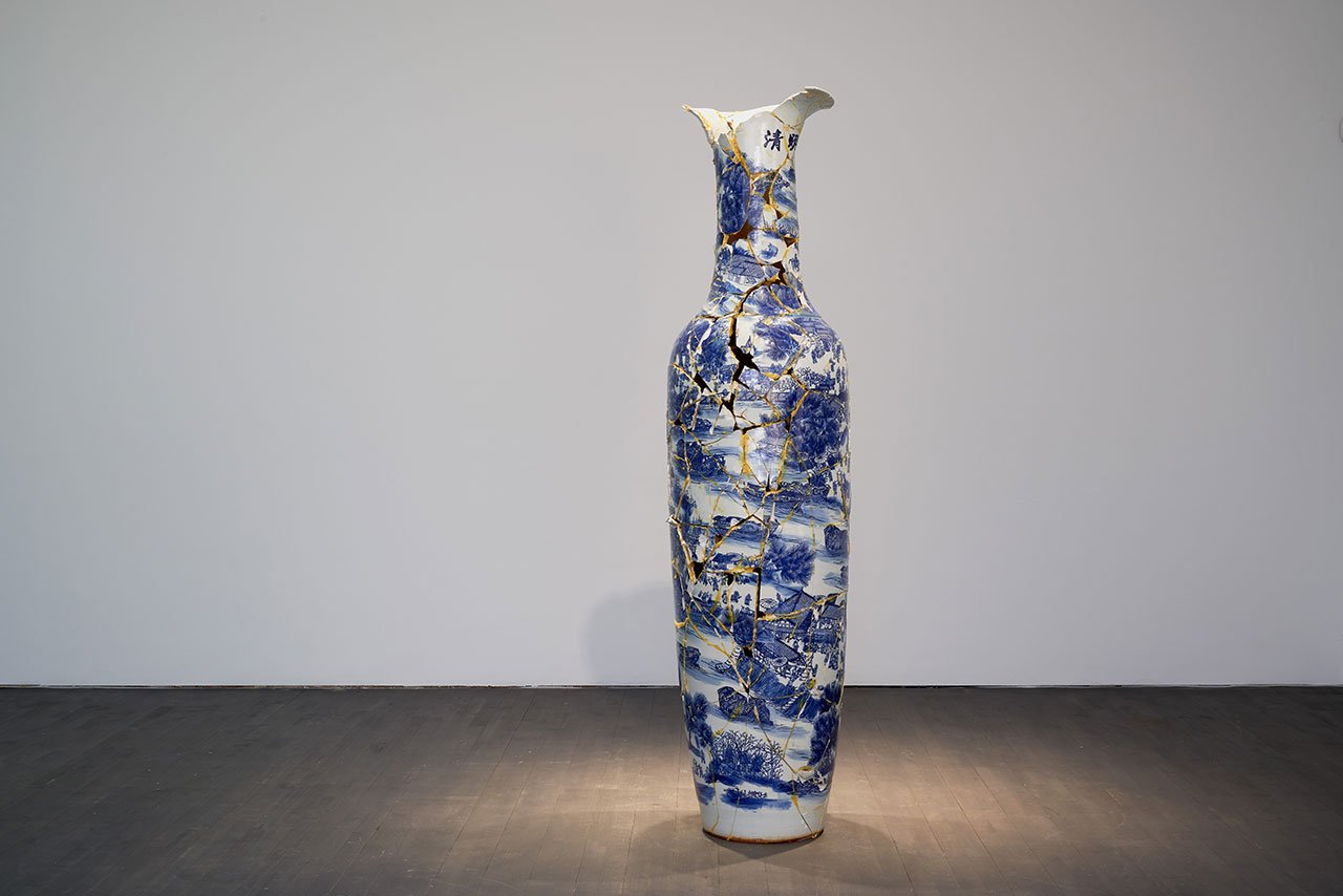 Installation view. Kris Martin, EXIT at S.M.A.K., Ghent, 2020. Photo by Dirk Pauwels.
Featured: Vase, 2005. Chinese porcelain, glue. Gaby and Wilhelm Schürmann Collection, Herzogenrath.
Artist's statement: I broke a Chinese vase and stuck it back together. Breaking and pasting as a metaphor for life. The vase reads in Chinese: The market and the people who go to the market.