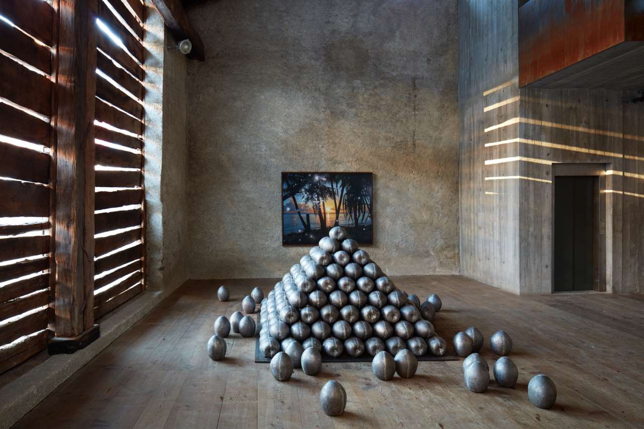 Julian Charrière, Pacific Fiction, 2016. Coconuts in lead sarcophagi, steel frames. Courtesy the artist; Petra Maria Singh, New York; Galerie Tschudi, Zuoz.