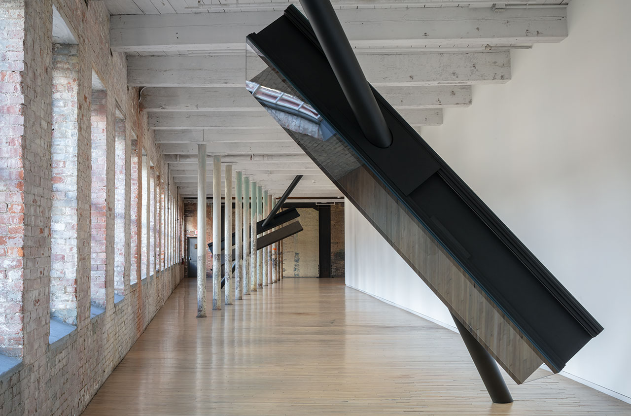 SARAH OPPENHEIMER, S-334473, 2019.Aluminum, steel, glass and existing architecture. Total dimensions variable.Installation view: Mass MoCA. 2019.Photo Credit: Richard Barnes.