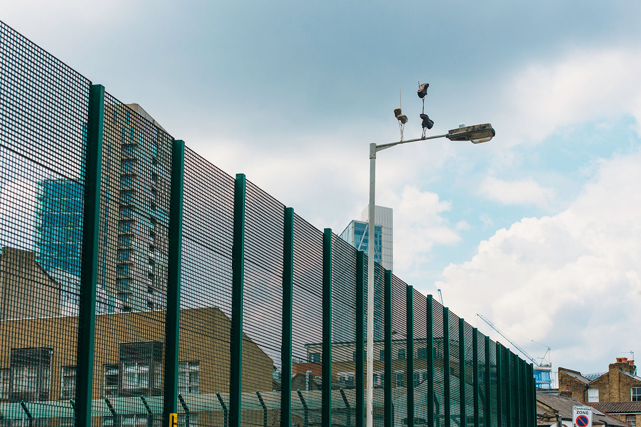 Pejac, Downside Up #1, East London, United Kingdom, 2016. Photo by Gary Van Handley.