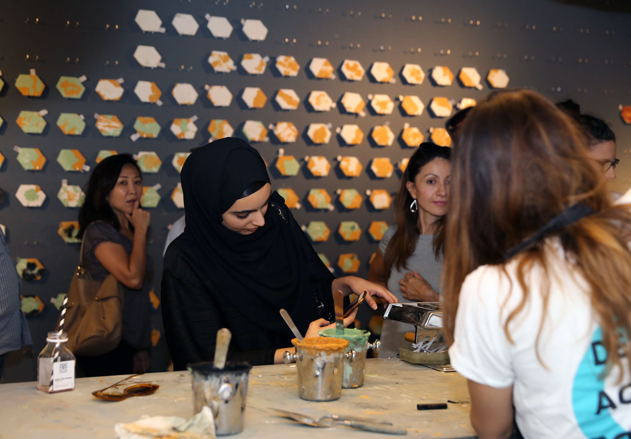 Memoir Bar by Thukral &amp; Tagra ( New Delhi-based design duo Jiten Thukral and Sumir Tagra. Visitors had to pick a memory and write it down on a piece of paper. Shred it into a fine form and watch it being made into a tile.
Memoir Bar. India participation in Dubai Design Week, Abwab 2016.