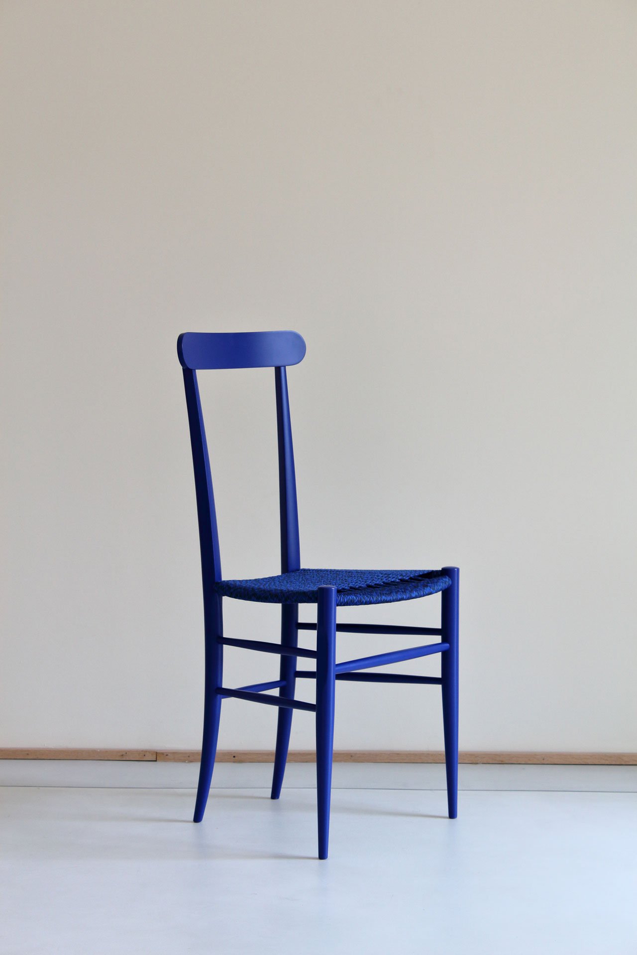 Solferino chair designed under Domenico Rocca’s artistic direction for Eligo. A reinterpretation of the company’s Chiavarina wooden chair.