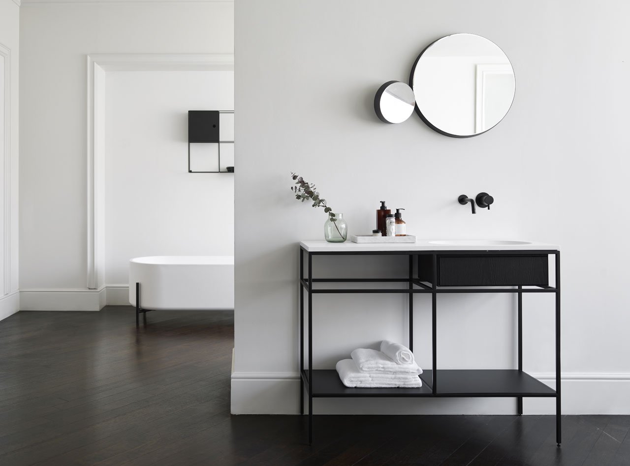 Limited edition Frame System made of Smoked oak and Navona travertine by Norm.Architects and Float &amp; Gravity  bathroom mirrors by Samuel Wilkinson, both designed for Ex.t. 