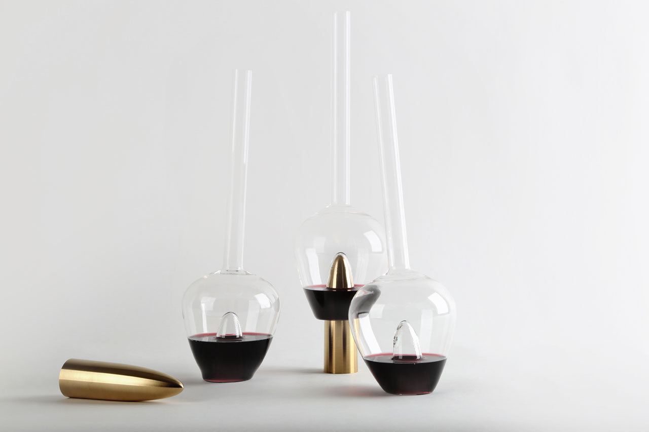 Plugged Carafes by Lebanese interior architect and product designer Richard Yasmine. Made of solid brushed brass and a very thin hand blown borosilicate glass. Photo by BizarreBeirut.
