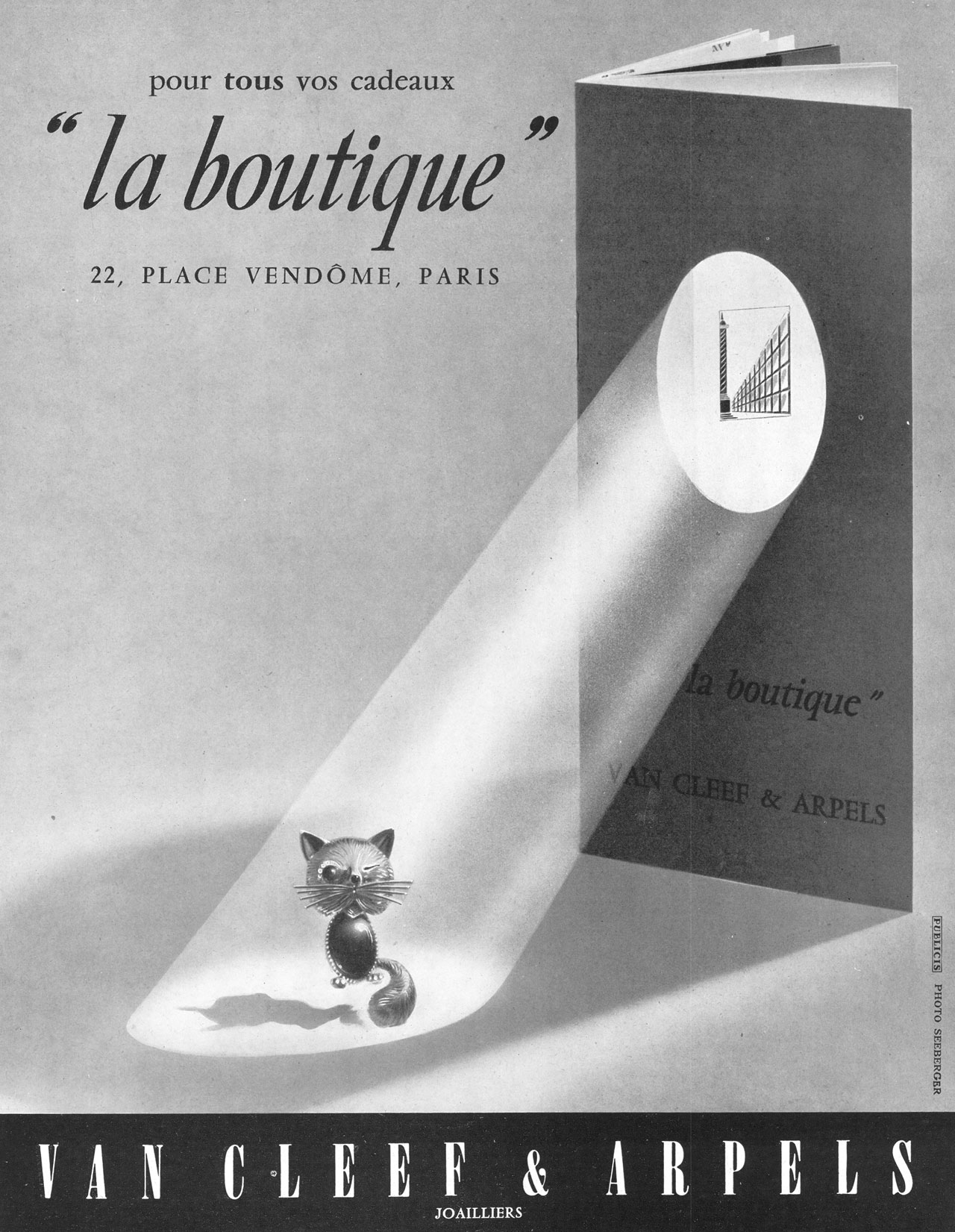 La Boutique advert, featuring the Chat Malicieux, June 1955. Photo © Seeberger.