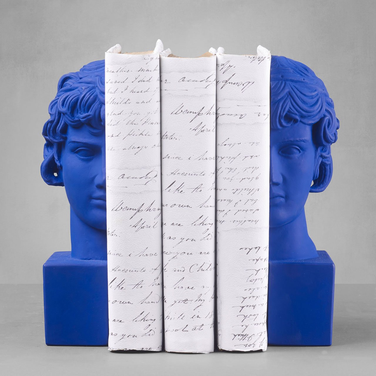 Antinoos Set of 2 Bookends. 
Weight: 4500 grDimension: 29.5x6.5x16.5 cmMaterial: ceramineColor: yves klein blue