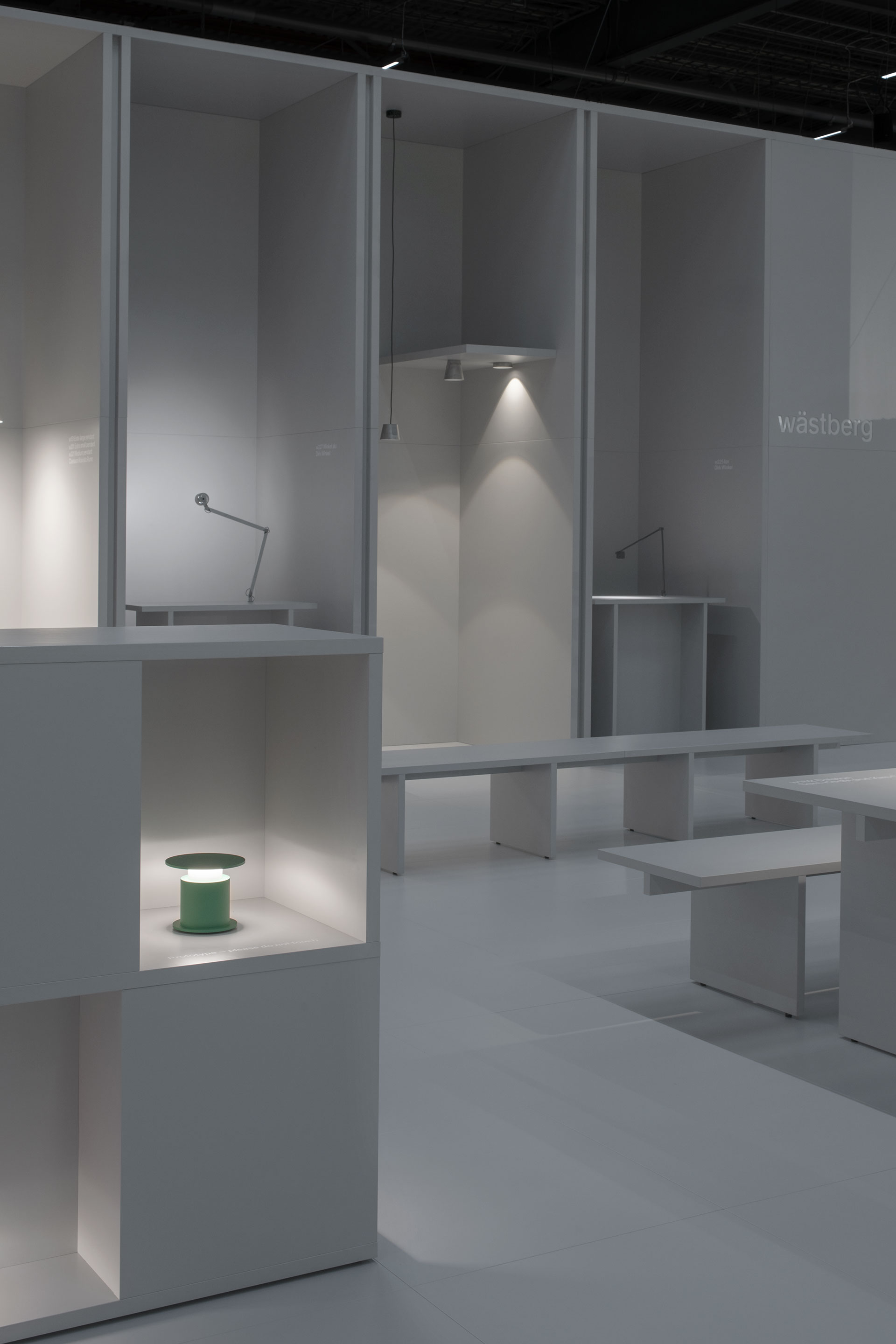 The green battery lamp Faro by David Chipperfield for Wästberg. Installation view at Stockholm Furniture Fair 2024.