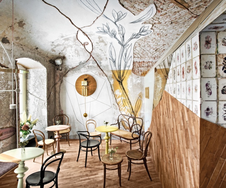 A Café in Slovenia is an Artisanal Amalgamation of Recycled Materials, Reused Furniture and Floral Murals