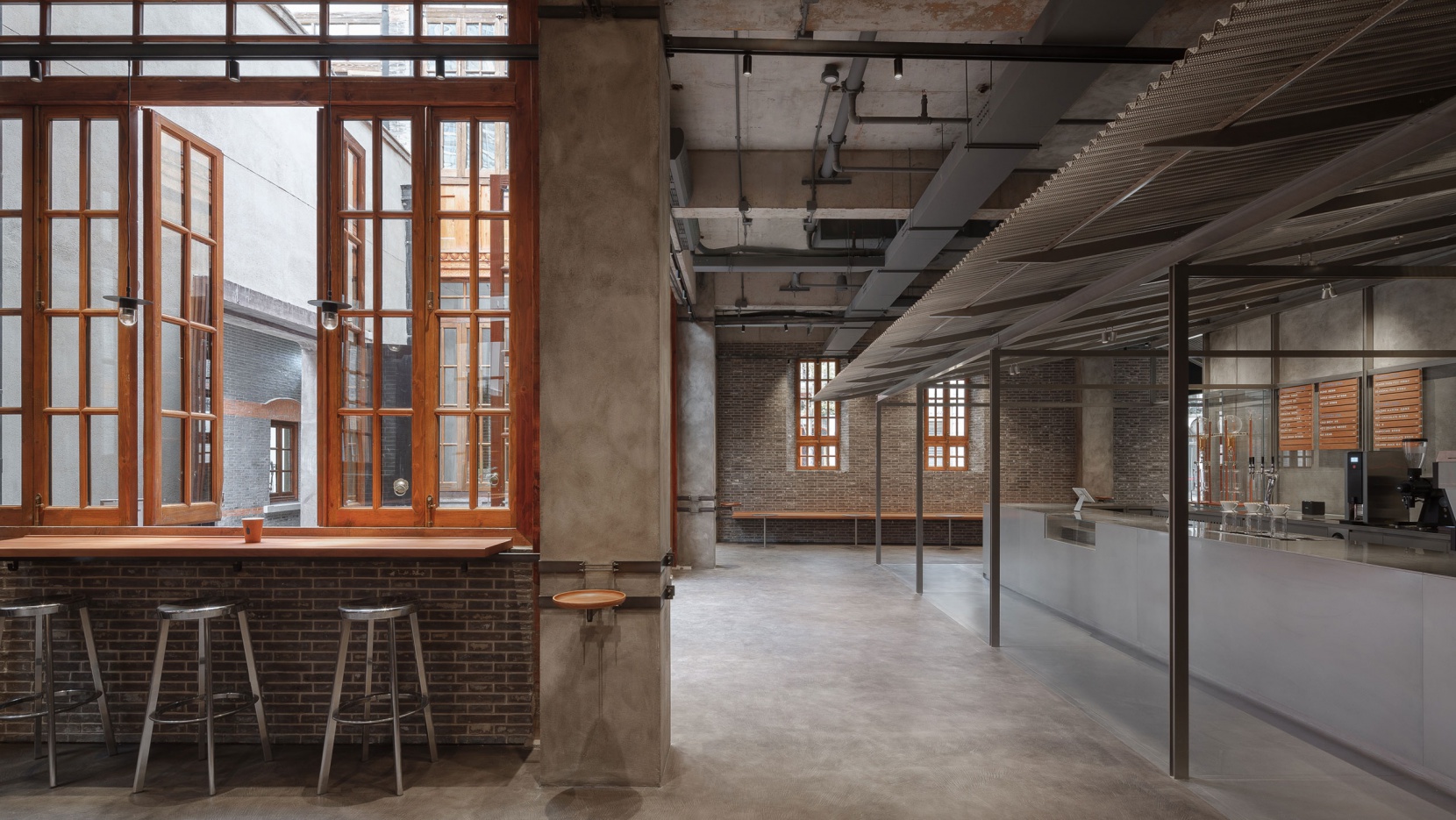 Traditional Chinese roof tiles decorate Blue Bottle Coffee shop in Shanghai