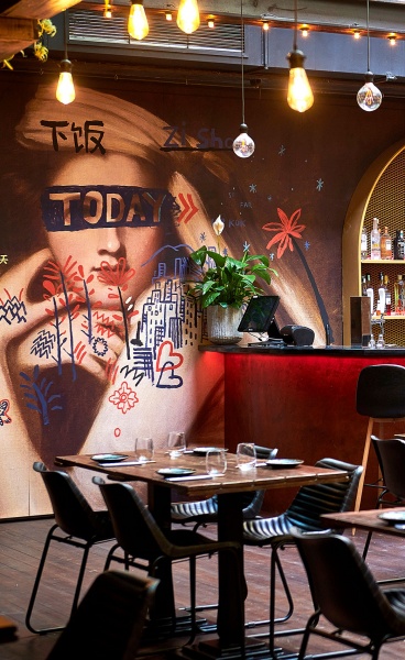 An Asian Restaurant in Budapest Mixes Retro-Industrial References with Hong Kong's Urban Grit